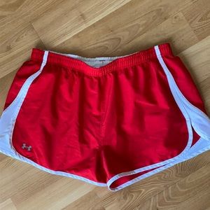 Red and white Under Armour athletic shorts